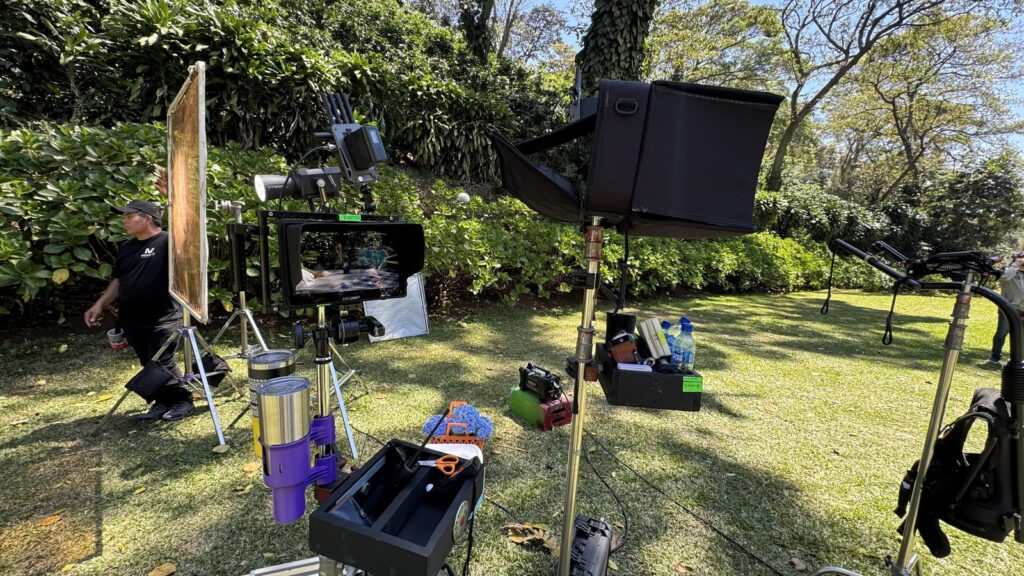 Outdoor film set on a green lawn in Nicaragua, a key factor in deciding when to film